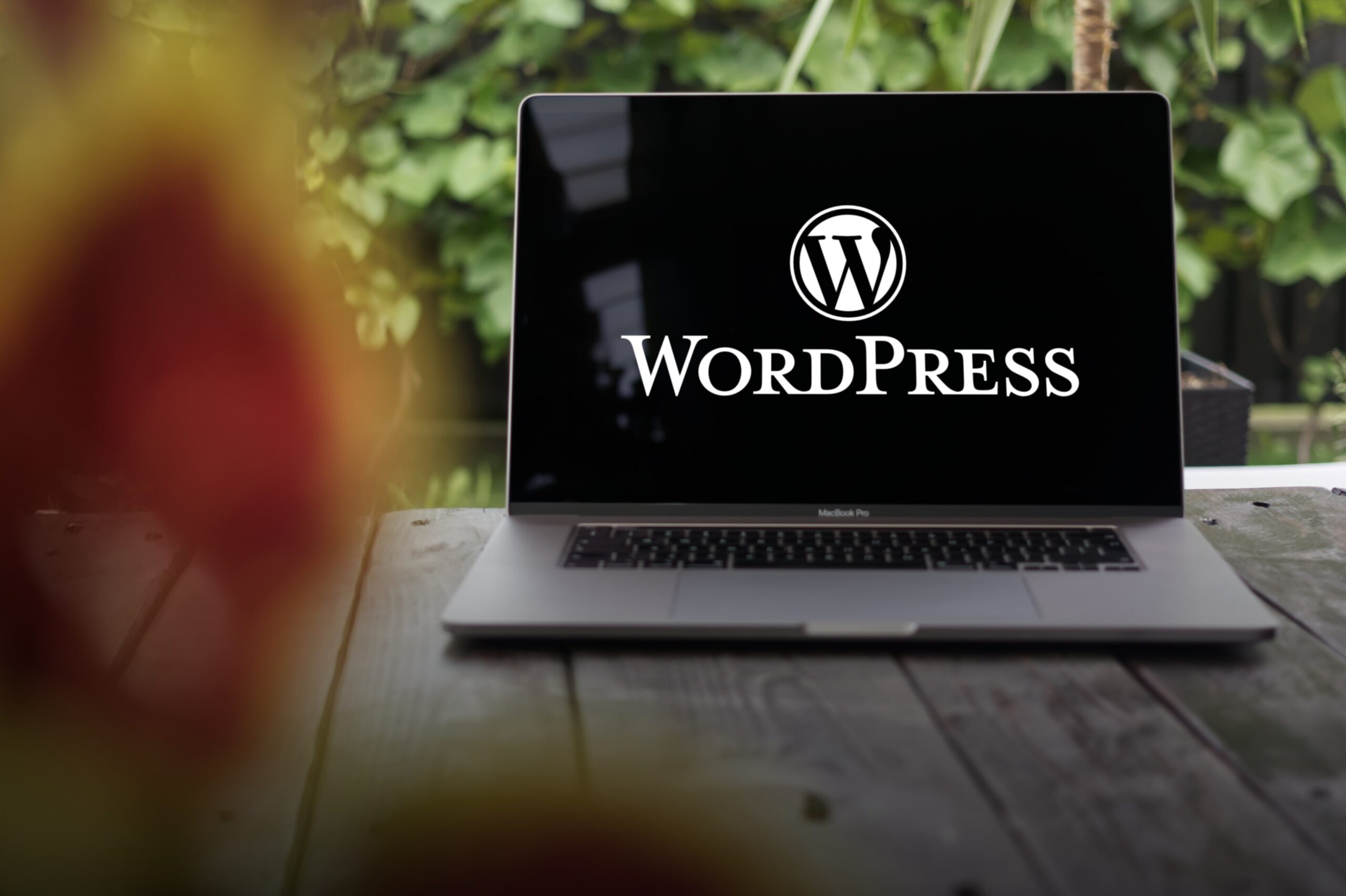 Dark laptop screen with WordPress logo