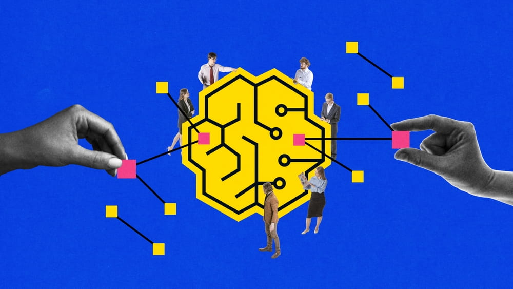 Illustration of a yellow brain-shaped circuit with people standing on it, two hands connecting pink squares to the brain—symbolizing AI Adoption and Overcoming Fear—all set against a blue background.